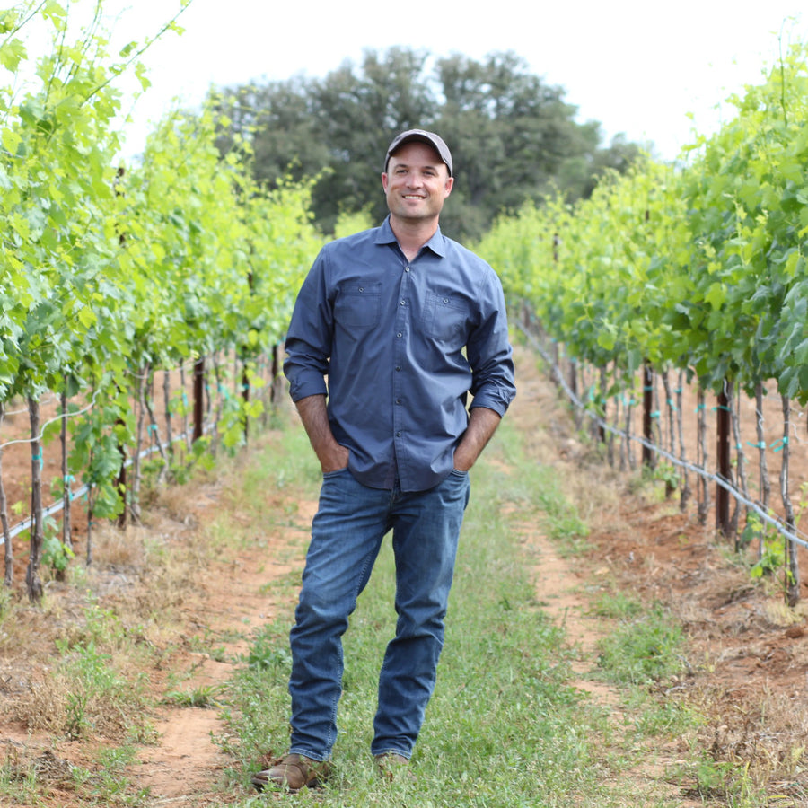 Top Texas Wines founder Bryan Chagoly in a Texas vineyard